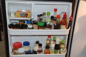 The top two shelves, laden with ingredients.